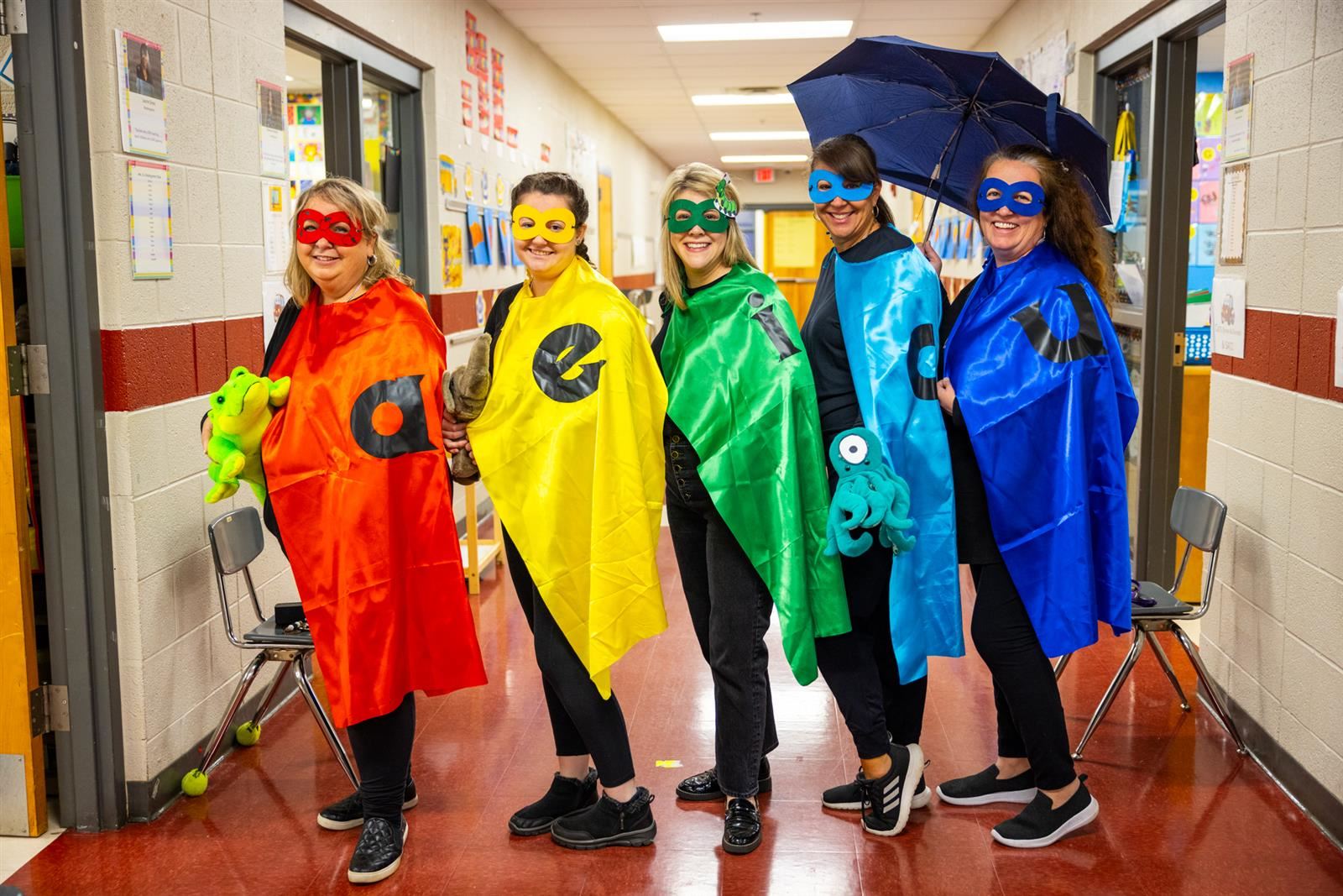 teachers in superhero outfits